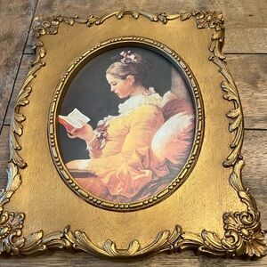 Framed Reproduction Of A Rococo Pairing “A Young Girl Reading” Oval Gold Frame